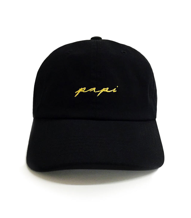 Papi Dad Hat – Black 6-panel cotton embroidered dad hat with gold cursive text. Funny golf hat & best gift for dads.